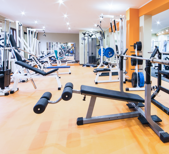 Clean gym with workout equipment