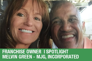 Two smiling people pose for a photo. Text reads: Franchise Owner Spotlight, Melvin Green, MJG, Incorporated.