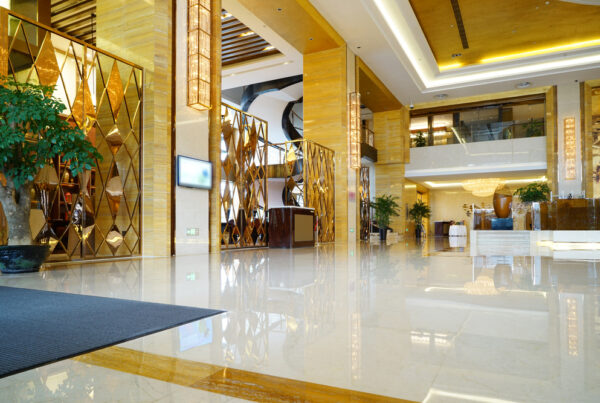Clean, modern hotel lobby featuring clean flooring and clean carpeting.
