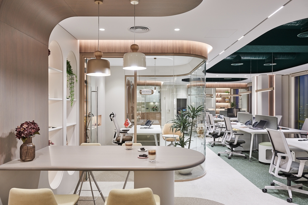 Modern interior office space featuring desks and chairs